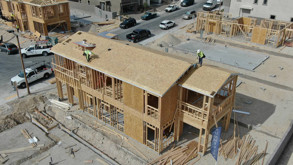 An aerial view of homes under construction in Cascades, a housing development near Far Hills Av ...