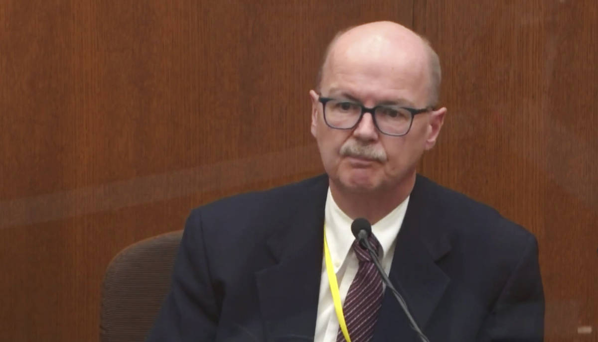 In this image taken from video witness Daniel Isenschmid, a forensic toxicologist testifies as ...