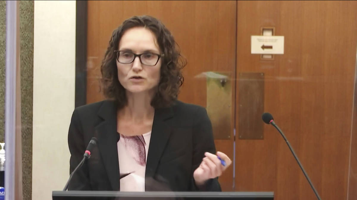 In this image taken from video, prosecutor Erin Eldridge questions witness Daniel Isenschmid, a ...