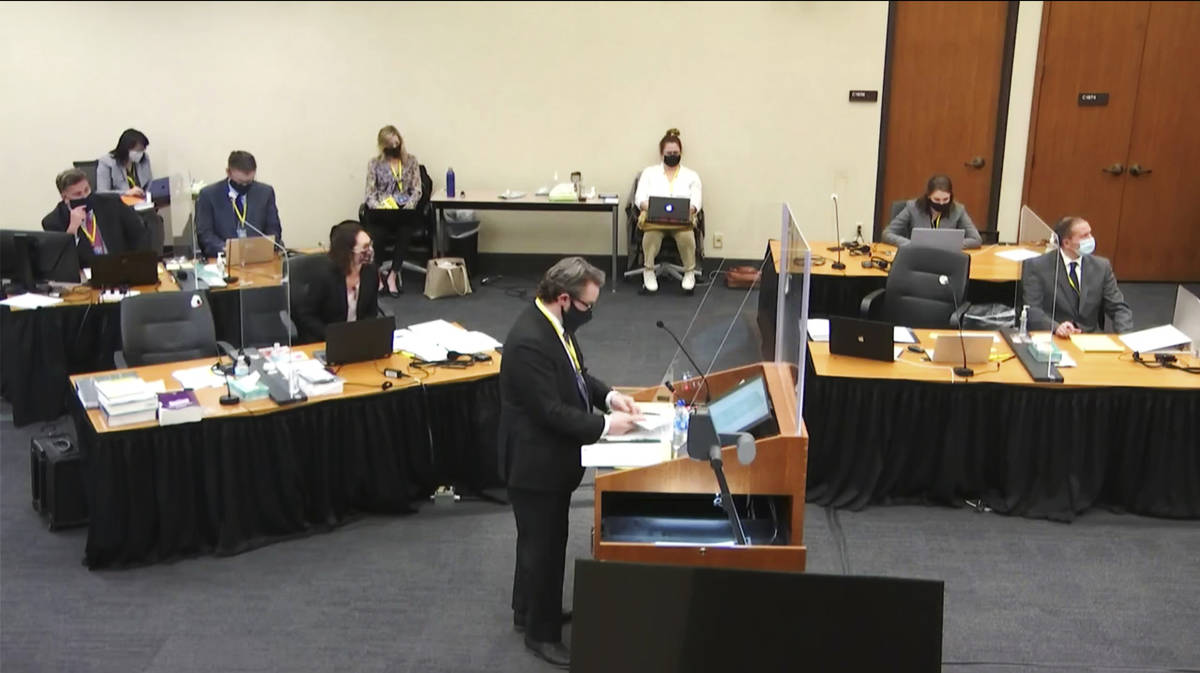 In this image taken from video, defense attorney Eric Nelson questions witness Daniel Isenschmi ...