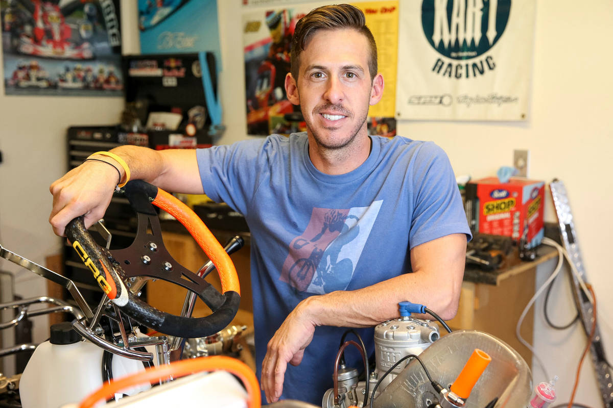 Las Vegas resident and racer instructor Matt Jaskol poses in his garage at his house in Las Veg ...