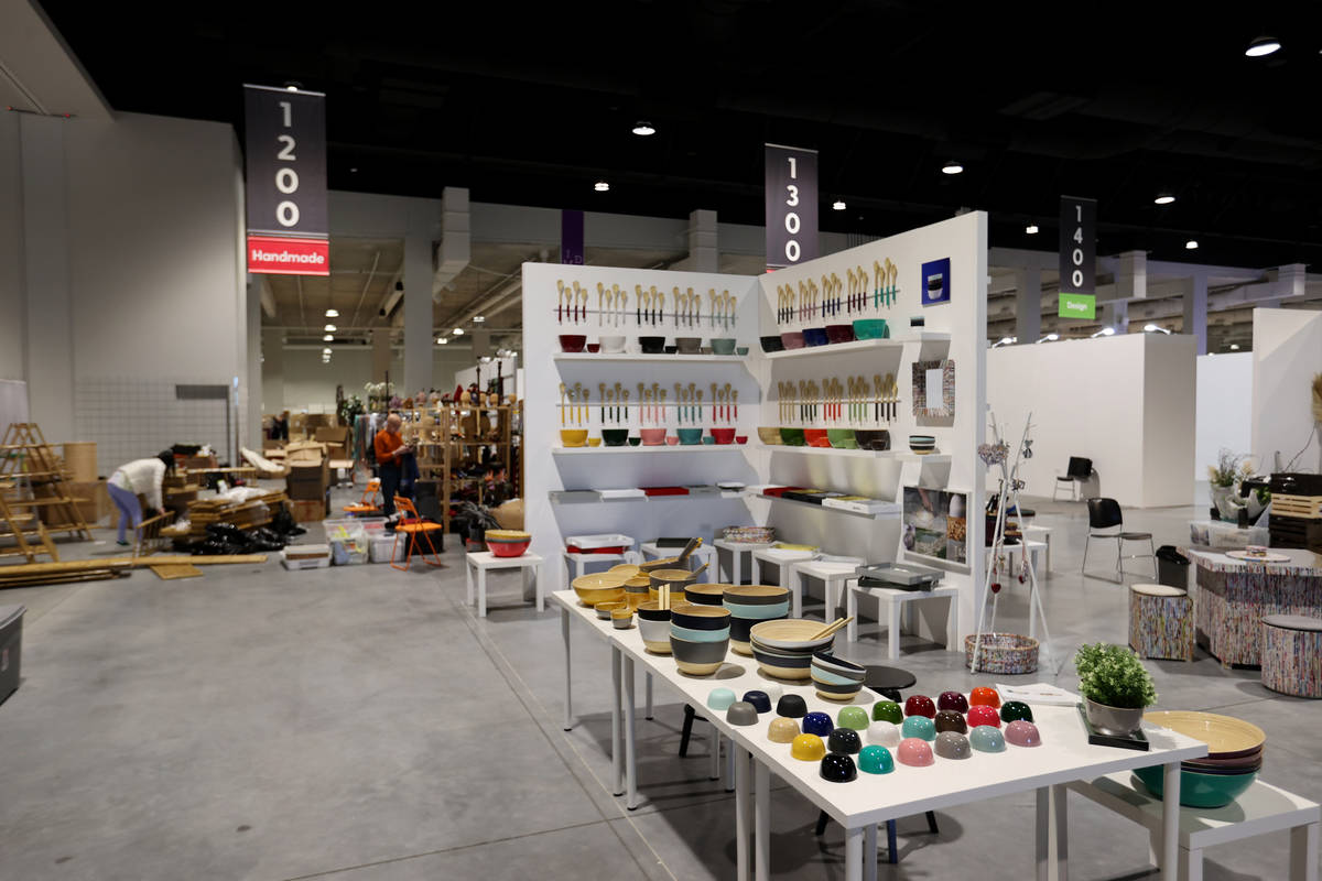 Gift and home temporary exhibitors set up for the Las Vegas Market after a ribbon-cutting cerem ...