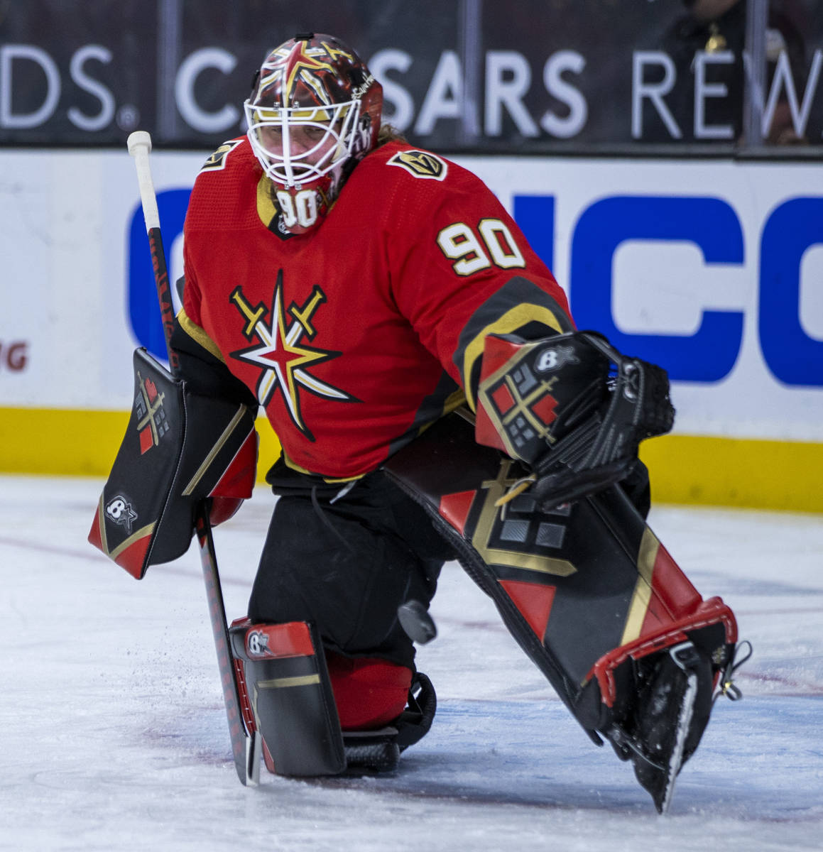 Golden Knights goaltender Robin Lehner (90) stretches for a save prior to the first period of a ...