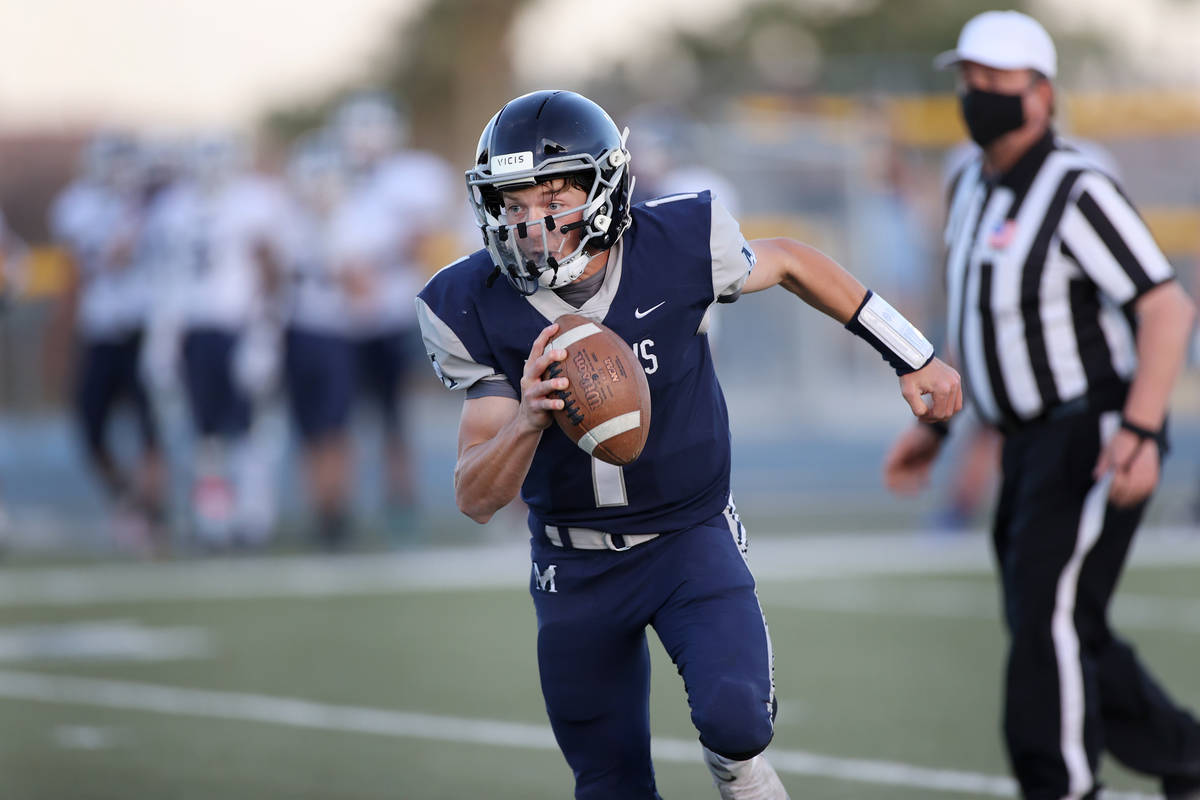 Meadows' Michael Corrigan (1) runs the ball for a two point conversion in the second quarter of ...