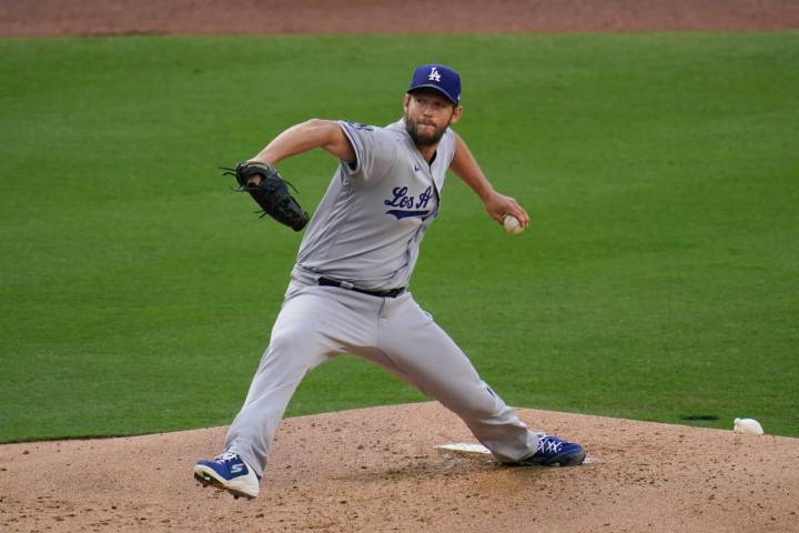 Los Angeles Dodgers starting pitcher Clayton Kershaw works against a San Diego Padres batter du ...