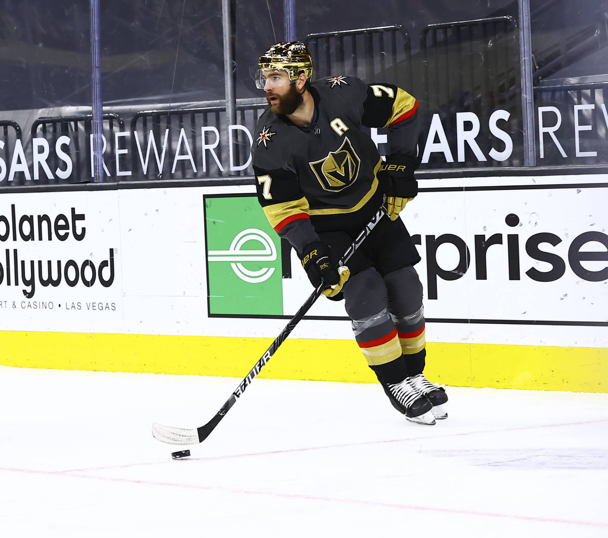 Golden Knights' Alex Pietrangelo (7) skates with the puck during the first period of an NHL hoc ...