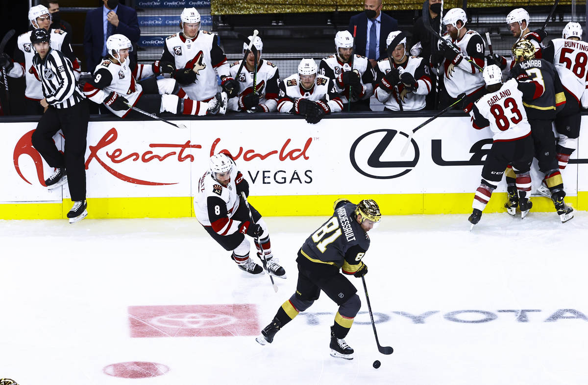 Golden Knights' Jonathan Marchessault (81) skates with the puck in front of Arizona Coyotes' Ni ...