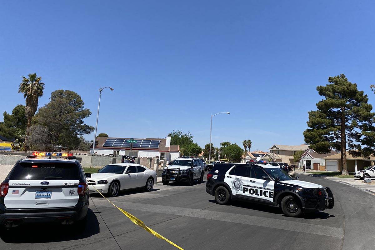 Police investigate a barricade situation Monday, April 12, 2021, on the 7200 block of Dingo Cou ...