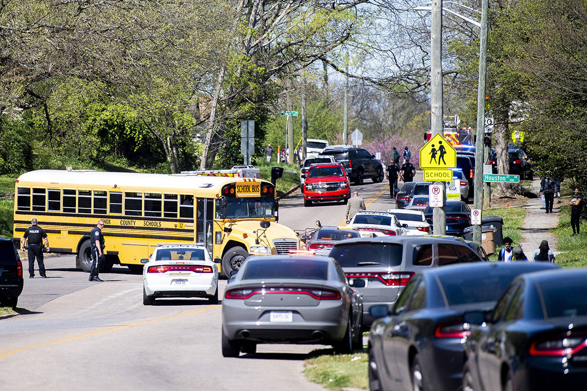 Police work in the area of Austin-East Magnet High School after a reported shooting Monday, Apr ...