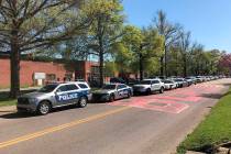 Police work in the area of Austin-East Magnet High School after a reported shooting Monday, Apr ...