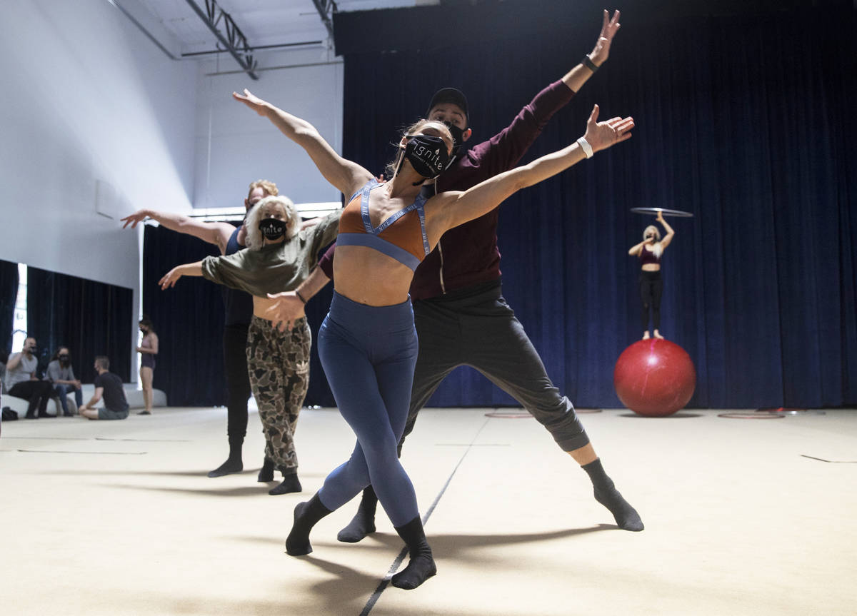 Image dancers Marina Pegado, foreground, and Taylor Bradley rehearse for "Ignite" at Nevada Rhy ...