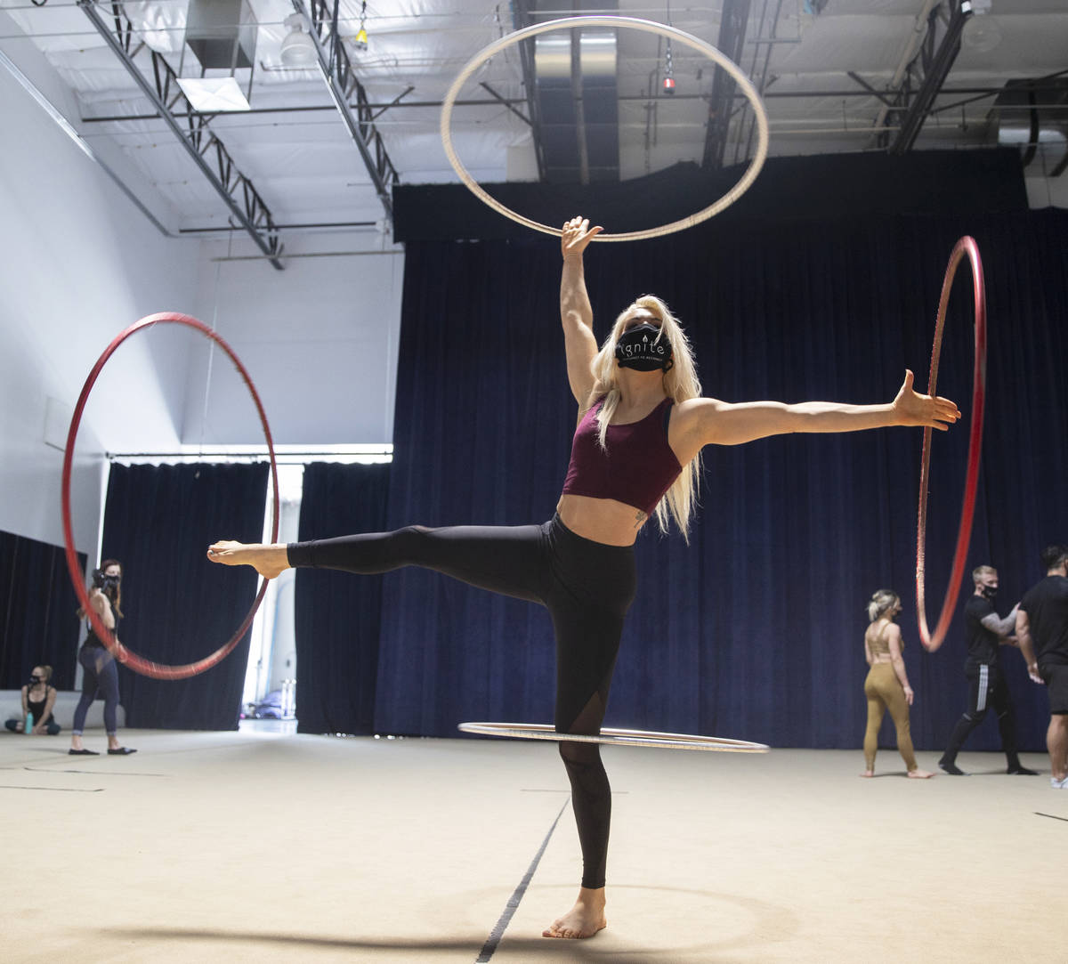 Hula hoop performer Grace Good rehearses for "Ignite" at Nevada Rhythmic Academy on Thursday, A ...