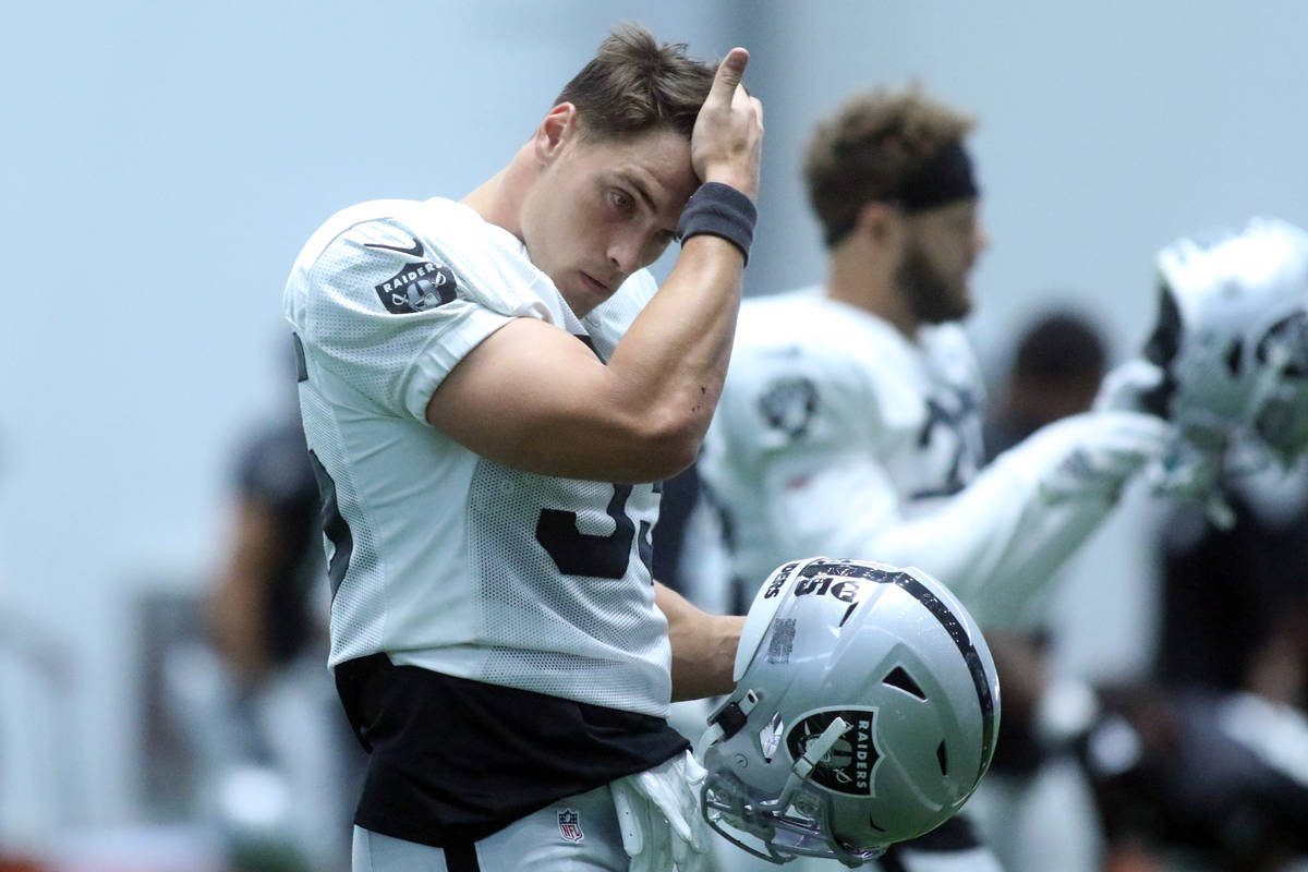 Las Vegas Raiders linebacker Tanner Muse (55) walks on the field during a practice session at t ...