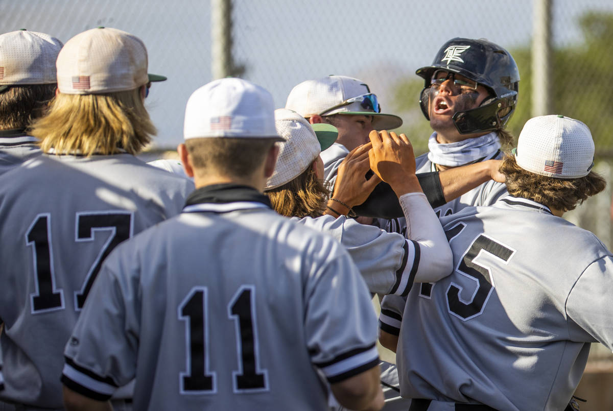 Palo Verde hitter Tommy DiLandri (7) is pumped up as he scores versus Basic during an NIAA base ...