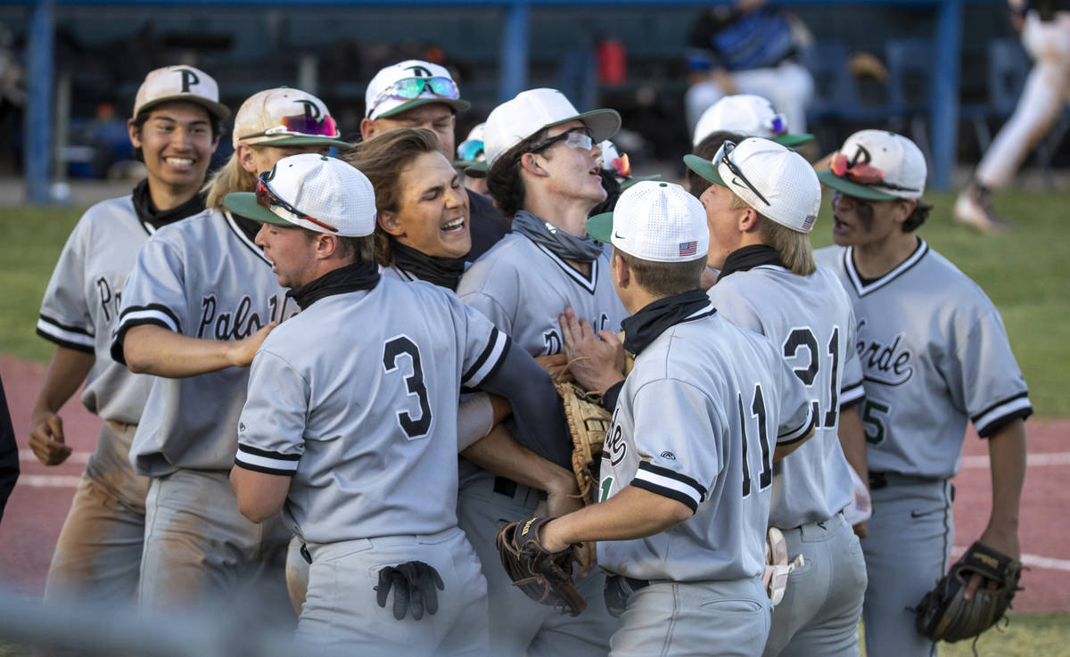Palo Verde players celebrate their win over Basic during an NIAA baseball game at Basic High Sc ...