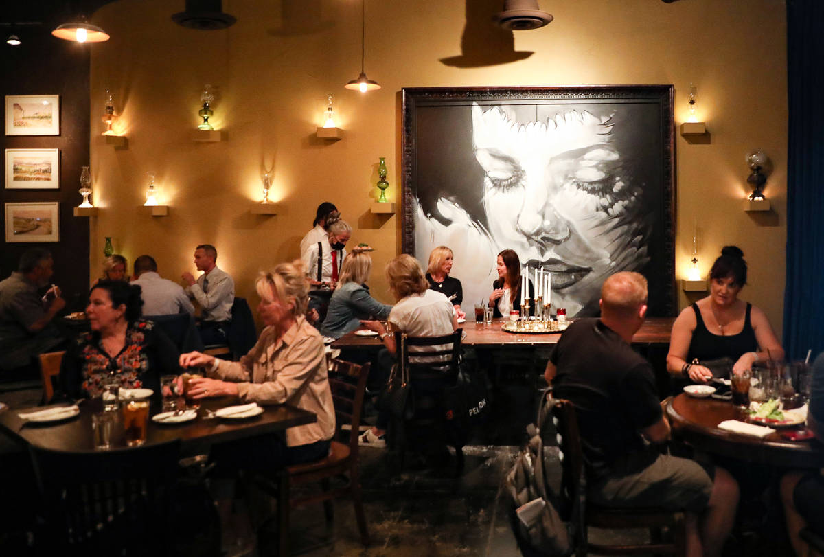 Old Soul, one of Chef Natalie YoungÕs restaurants, buzzes with customers from the first tr ...