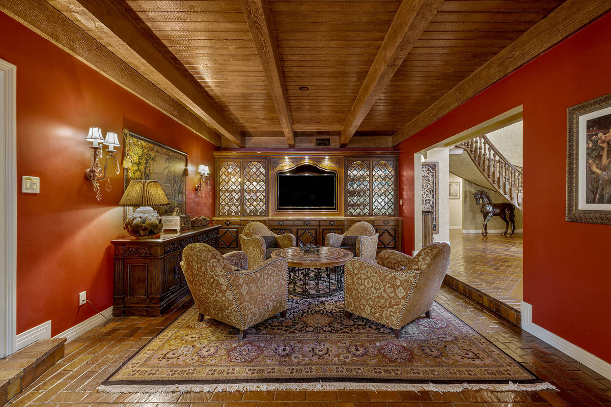 A den features built-in cabinets. (Fraser Almeida/Luxury Homes Photography)