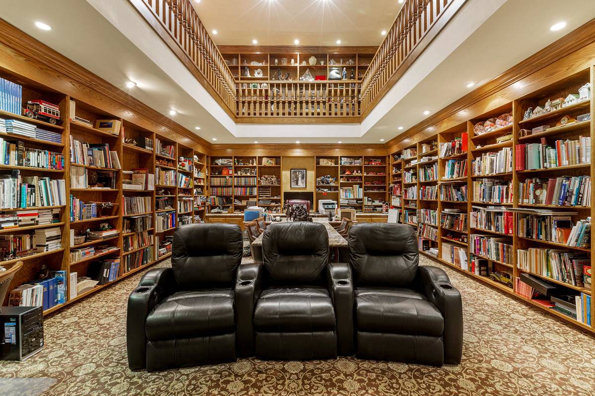 What had been a racquetball court has been converted into a two-story office in the basement. A ...