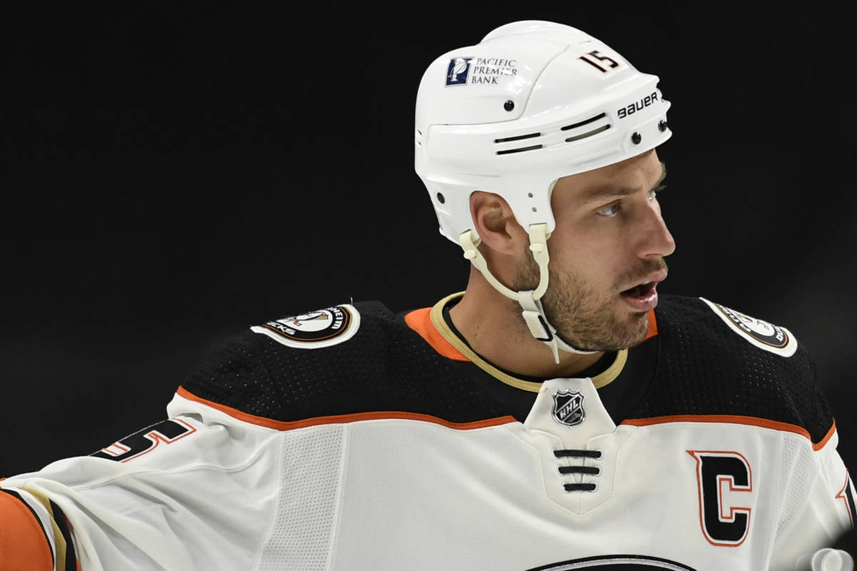 Anaheim Ducks' Ryan Getzlaf (15) prepares for a face-off against the Minnesota Wild during the ...