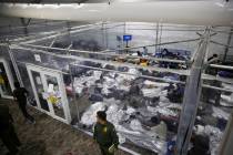 Minors are seen inside a pod at the Donna Department of Homeland Security holding facility in D ...
