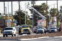 North Las Vegas police are investigating the death of a man found near a bus stop along Las Veg ...