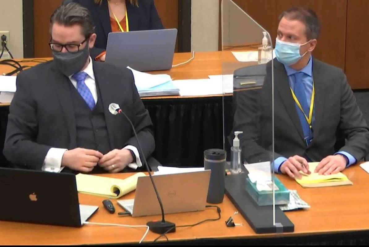 In this image from video, defense attorney Eric Nelson, left, and defendant, former Minneapolis ...