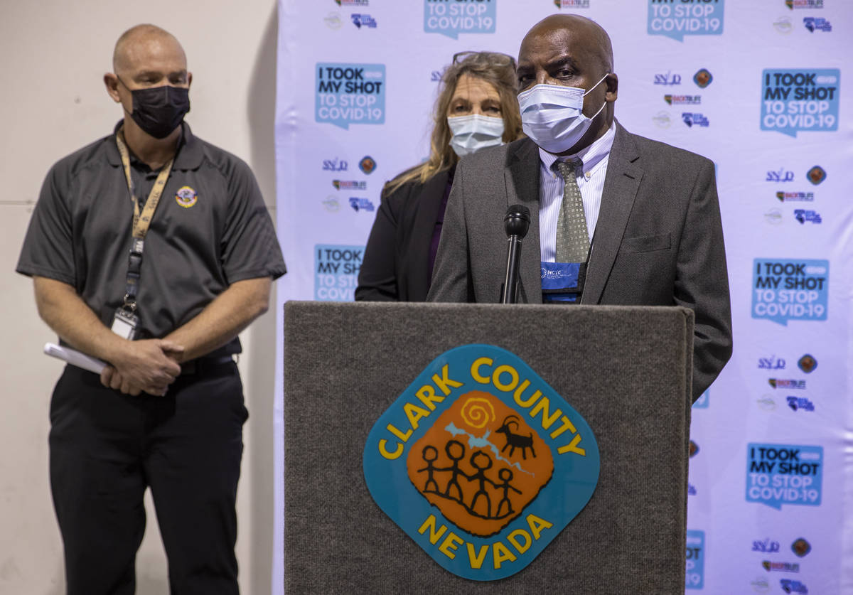 (From right) Dr. Fermin Leguen, Commissioner Marilyn Kirkpatrick and Chief Greg Cassell brief t ...