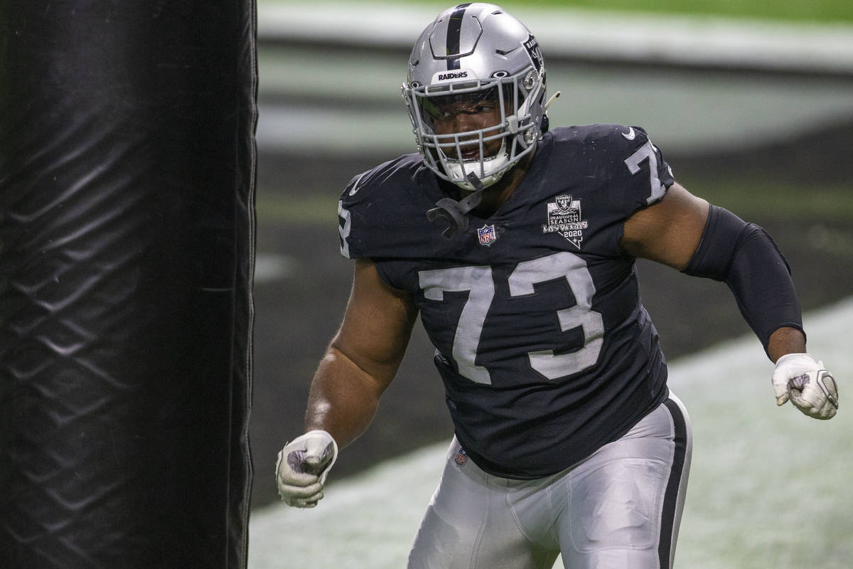 Raiders defensive tackle Maurice Hurst (73) runs through a drill before an NFL football game ag ...