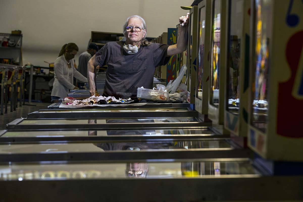 Pinball Hall of Fame owner Tim Arnold still repairs his machines at the new location across fro ...