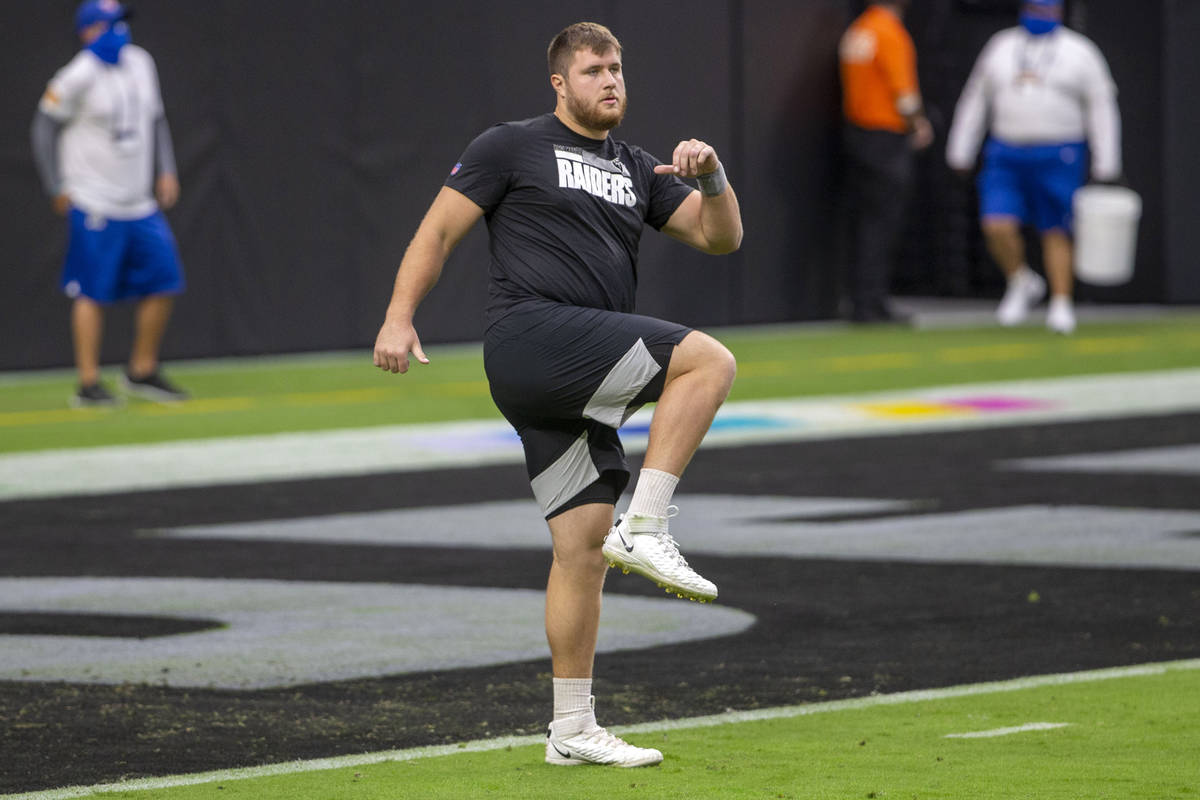 Las Vegas Raiders offensive tackle Kolton Miller (74) warms up before an NFL football game agai ...