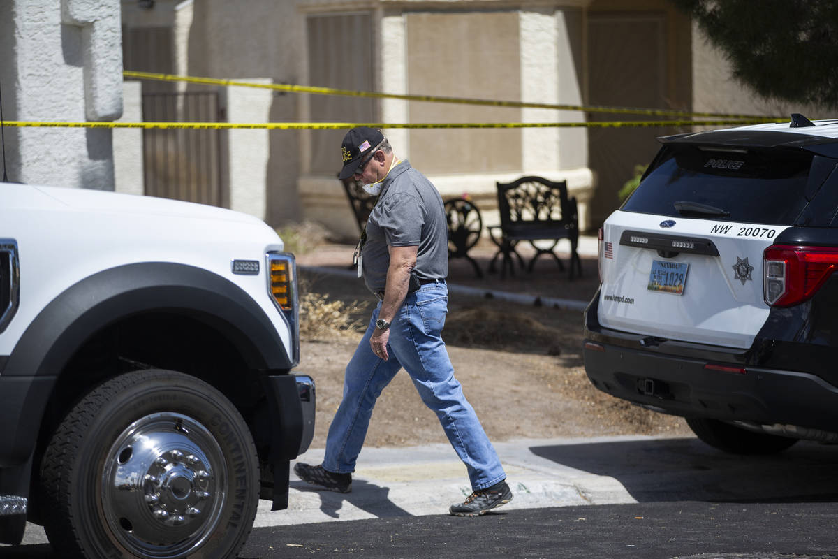 The Las Vegas Metropolitan Police Department investigate the discovery of human remains at a ho ...