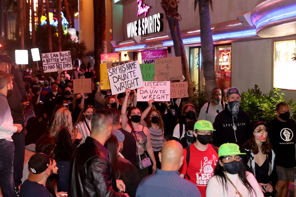 People protest on the Strip in Las Vegas Saturday, April 17, 2021, following the fatal police s ...