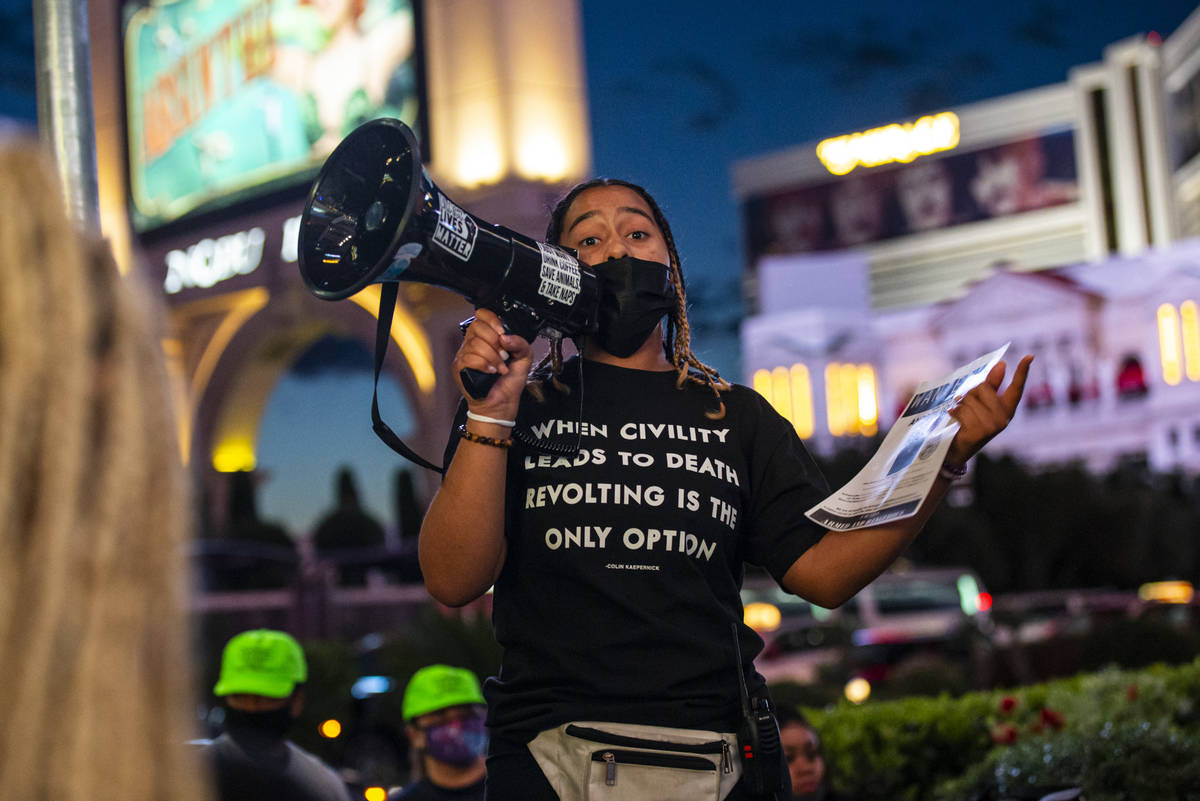 Desiree Smith, founder of More Than A Hashtag, center, speaks during a demonstration in solidar ...