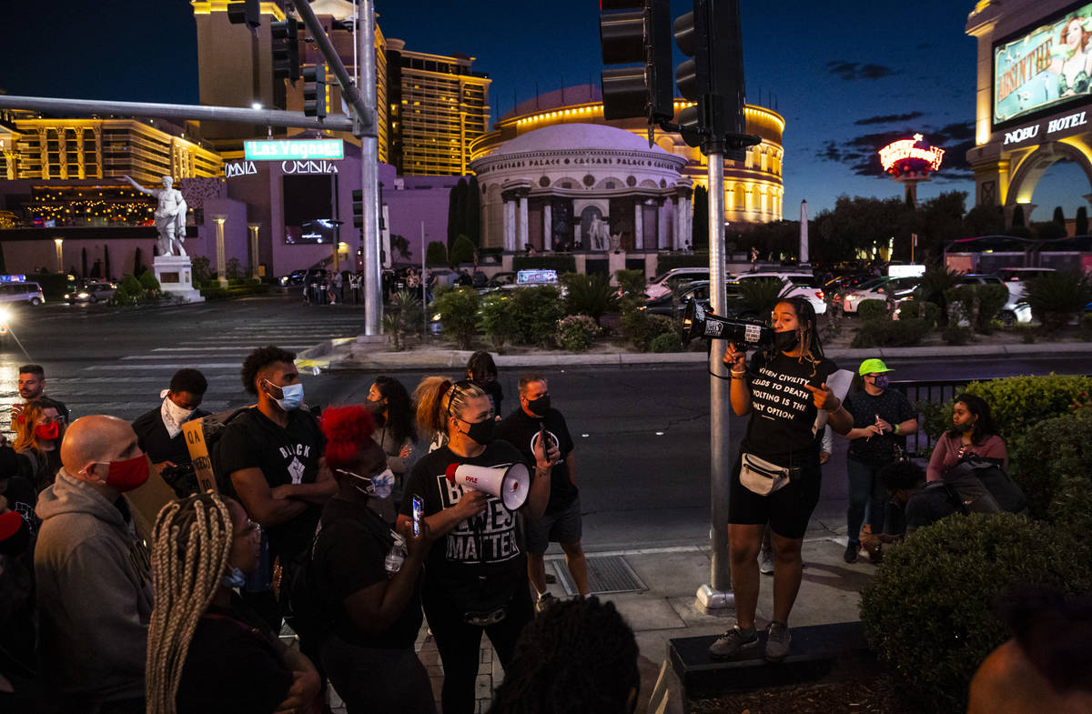 Desiree Smith, founder of More Than A Hashtag, center, speaks during a demonstration in solidar ...