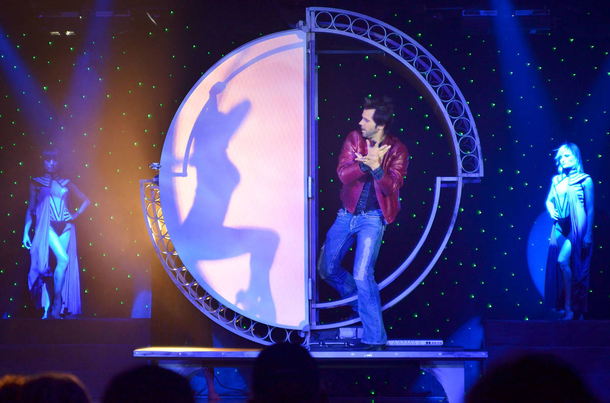 Magician Jan Rouven performs in "Illusions" at the Starlite Theater in the Riviera hotel-casino ...
