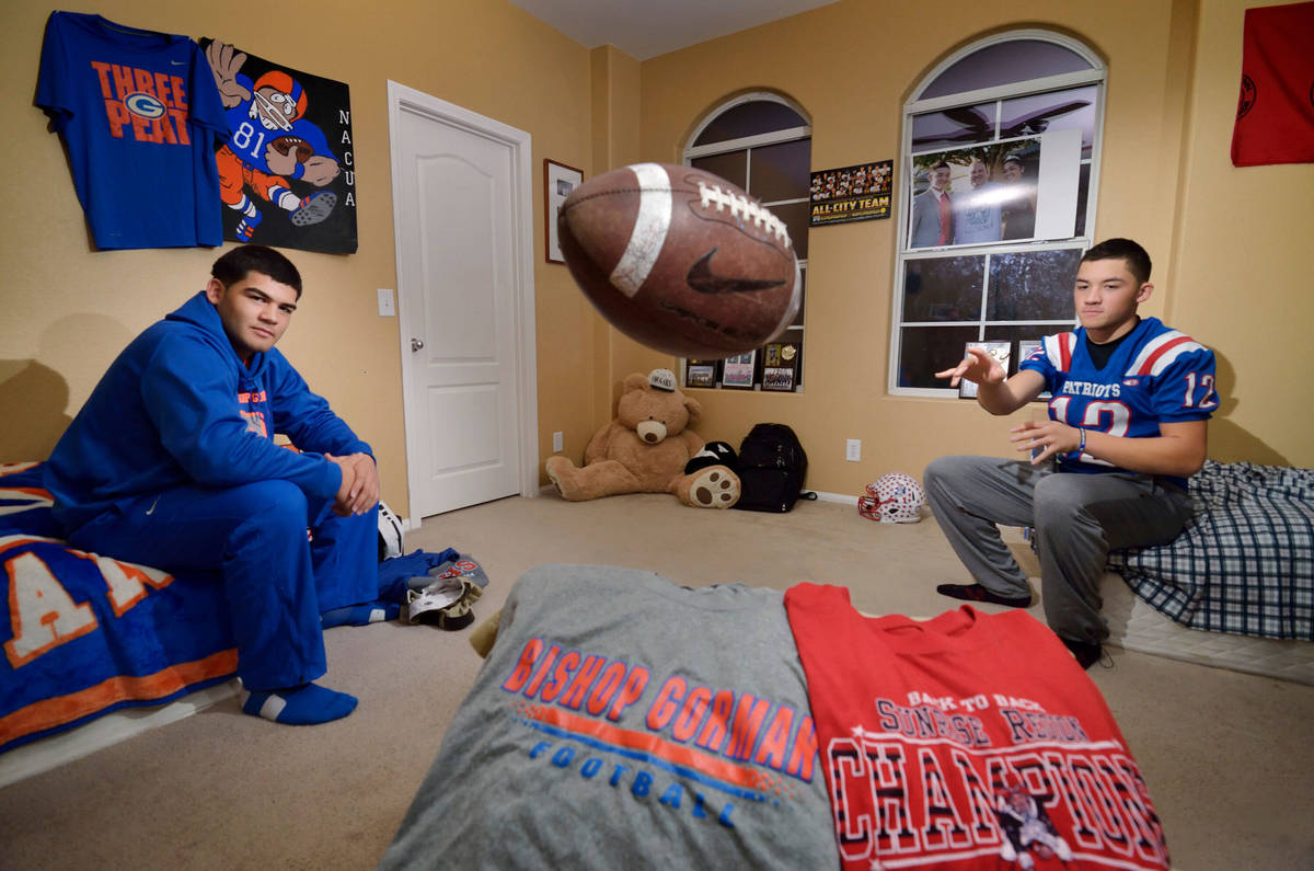 Isaiah Nacua, left, and his brother Kaimana, seen at their home near Decatur Boulevard and Blue ...