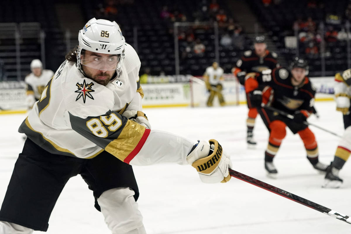 Vegas Golden Knights right wing Alex Tuch (89) shoots on goal during the first period of an NHL ...