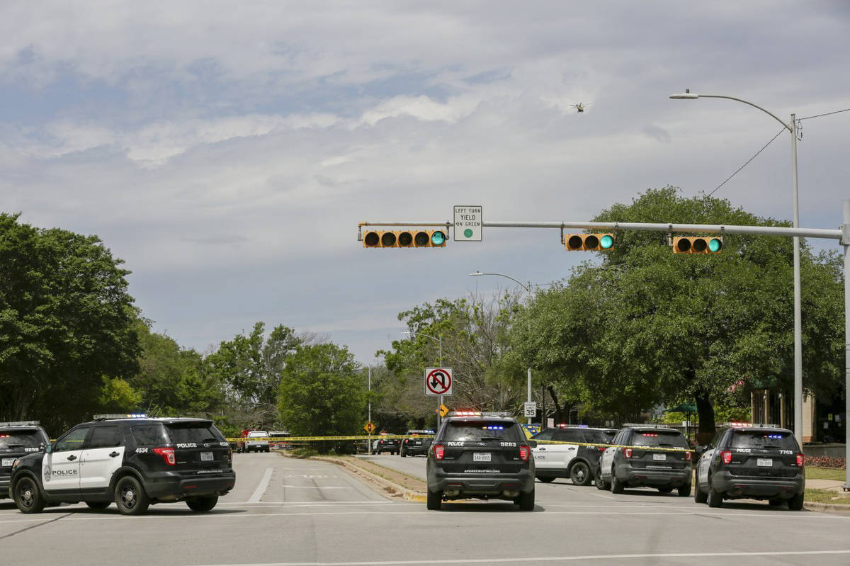 Austin police, SWAT and medical personnel respond to an active shooter situation located Great ...