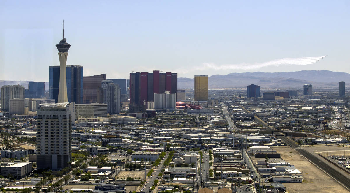 The Thunderbirds fly south of the Strip on their return to Nellis AFB as seen from the Legacy C ...