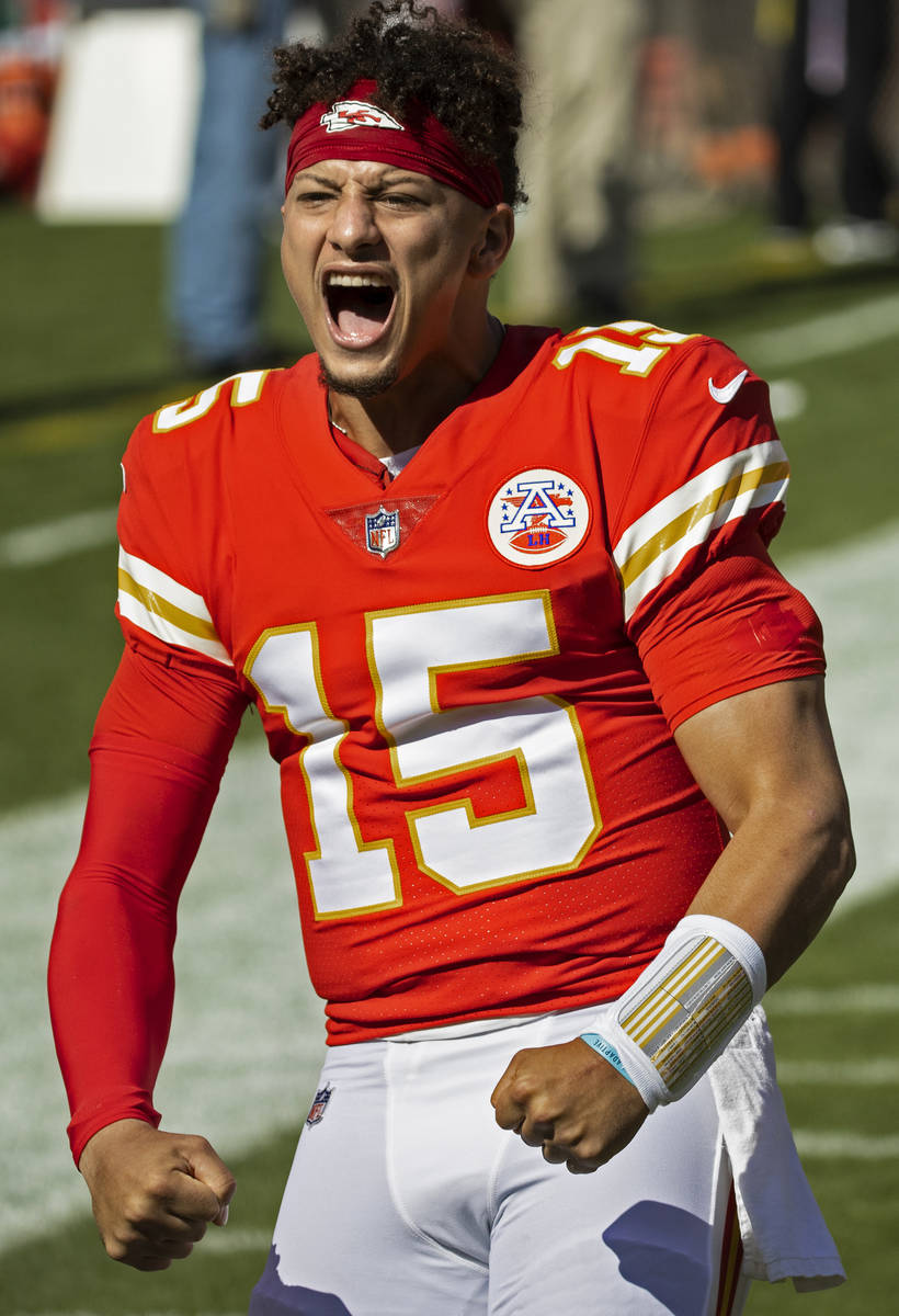 Kansas City Chiefs quarterback Patrick Mahomes (15) fires up the crowd during an NFL football g ...