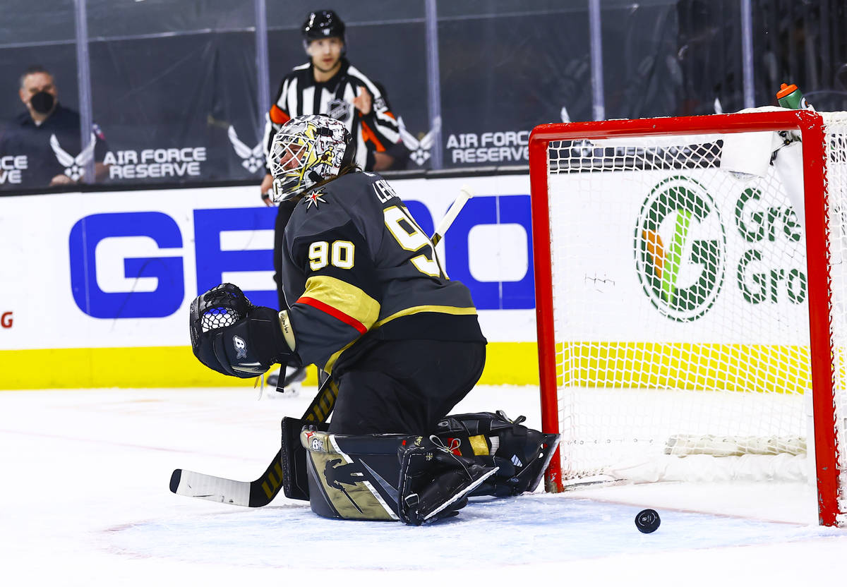 Golden Knights goaltender Robin Lehner (90) gives up a goal to the San Jose Sharks during the f ...