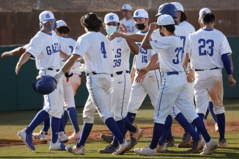 Bishop Gorman's Anthony Marnell (4) celebrates a walk-off hit with his team in the fifth inning ...