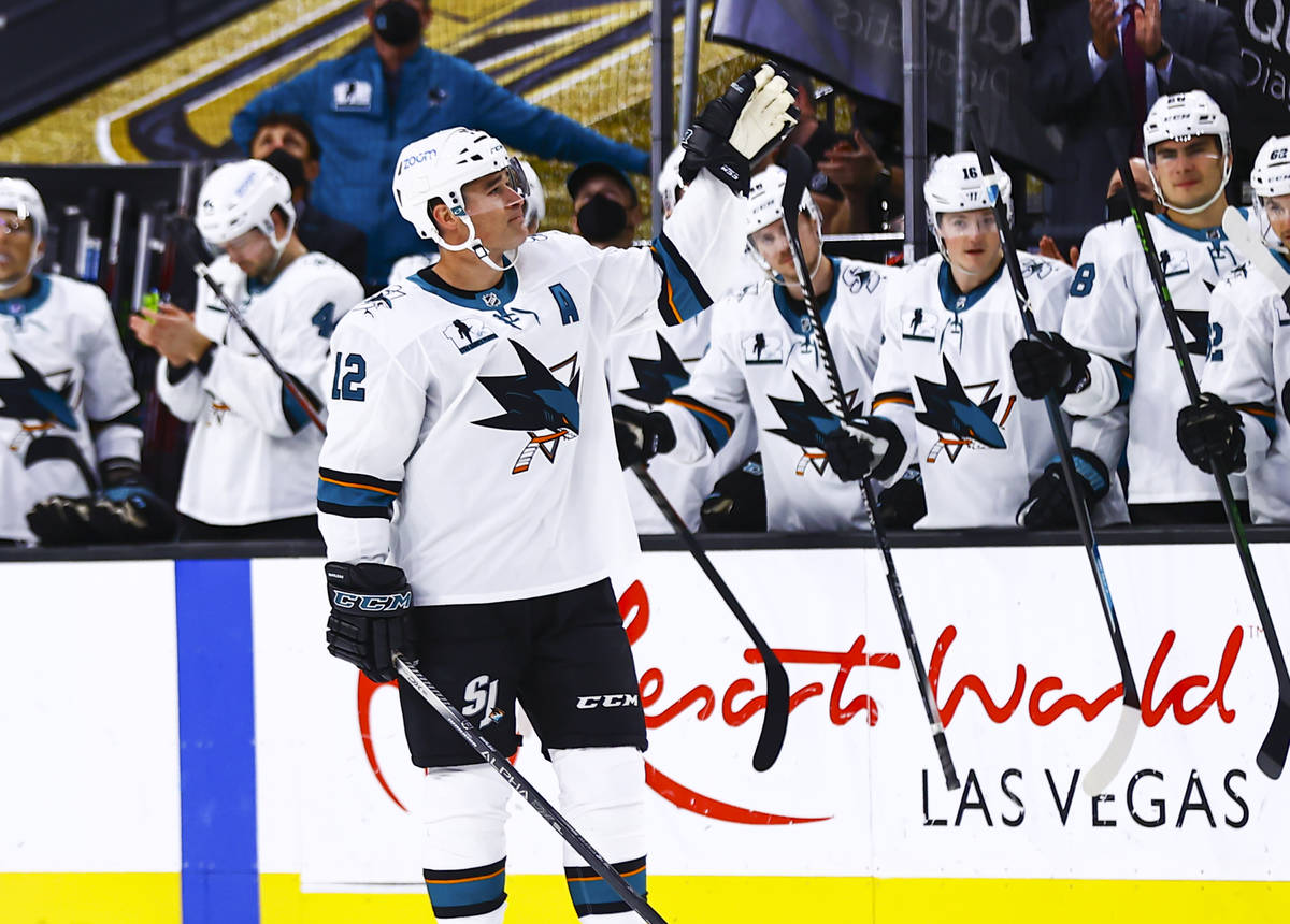 San Jose Sharks' Patrick Marleau acknowledges the crowd after being honored in the 1,768th regu ...