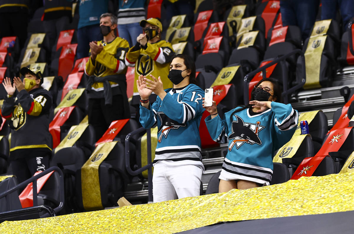 Hockey fans celebrate as San Jose Sharks' Patrick Marleau, not pictured, is honored in the 1,76 ...