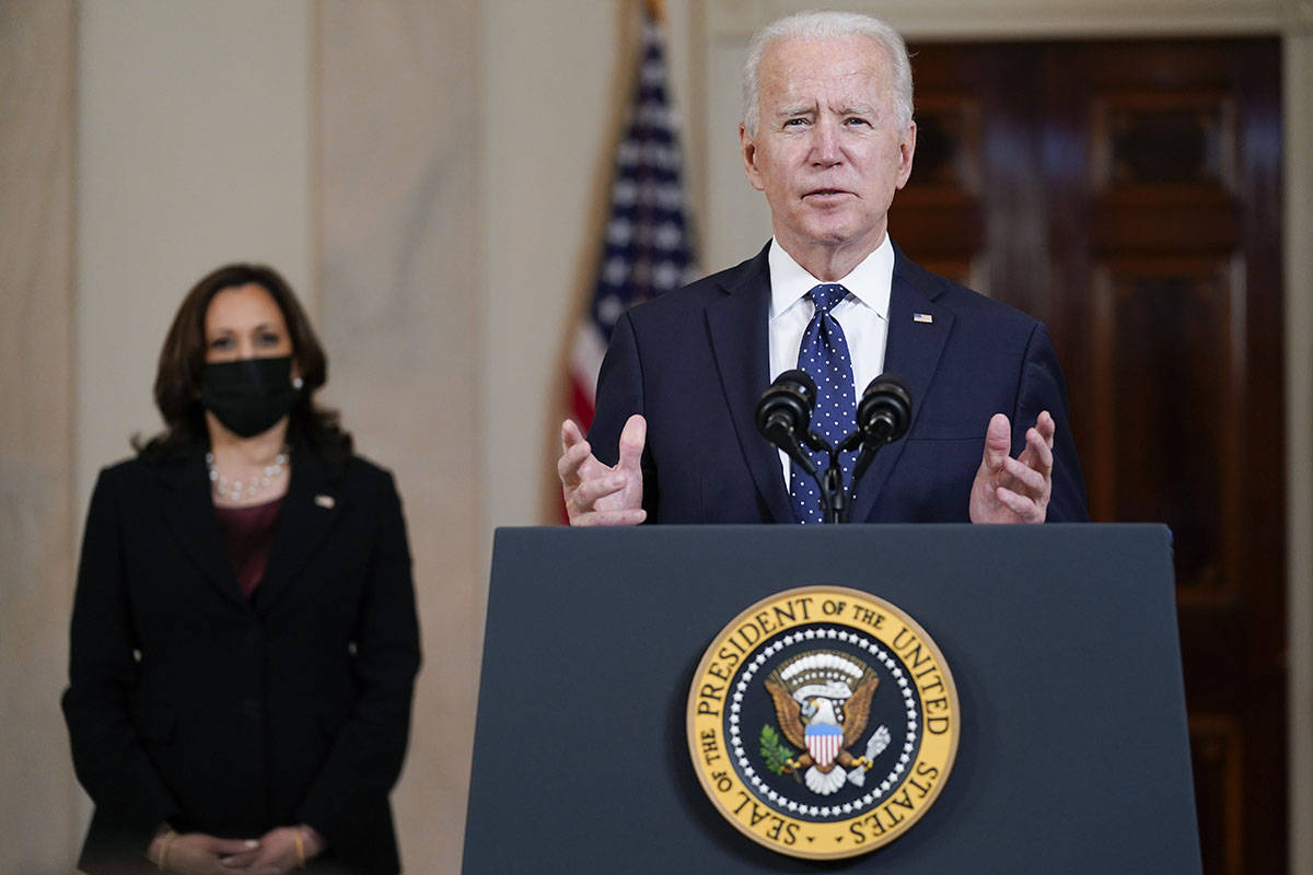 President Joe Biden, accompanied by Vice President Kamala Harris, speaks Tuesday, April 20, 202 ...