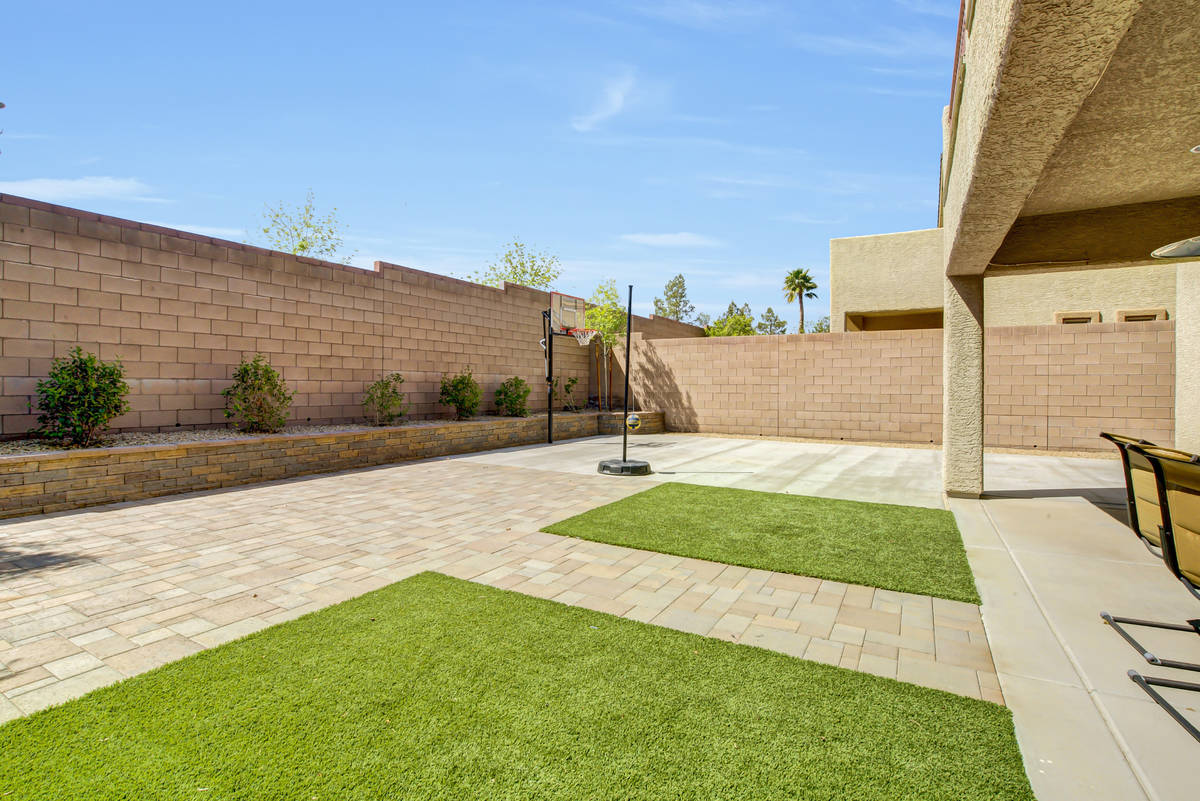 The rear yard (and basketball-ready area) of 837 Motherwell Ave. in Henderson (Casie and Derek ...