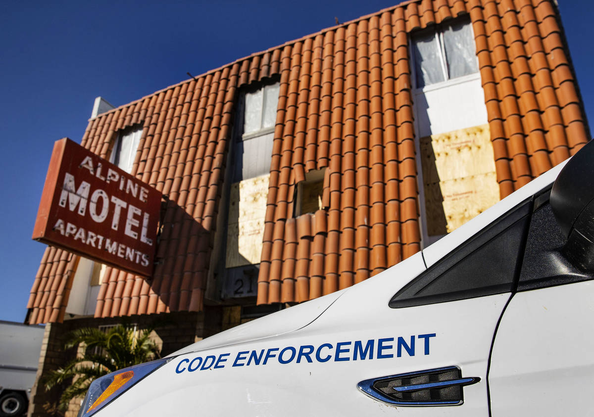 The code enforcement vehicle from the city of Las Vegas is parked outside of Alpine Motel Apart ...