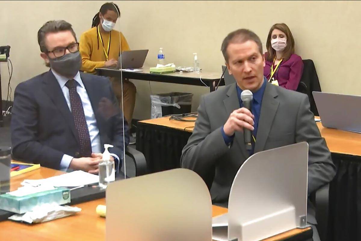 In this image from video, defense attorney Eric Nelson, left, and defendant, former Minneapolis ...