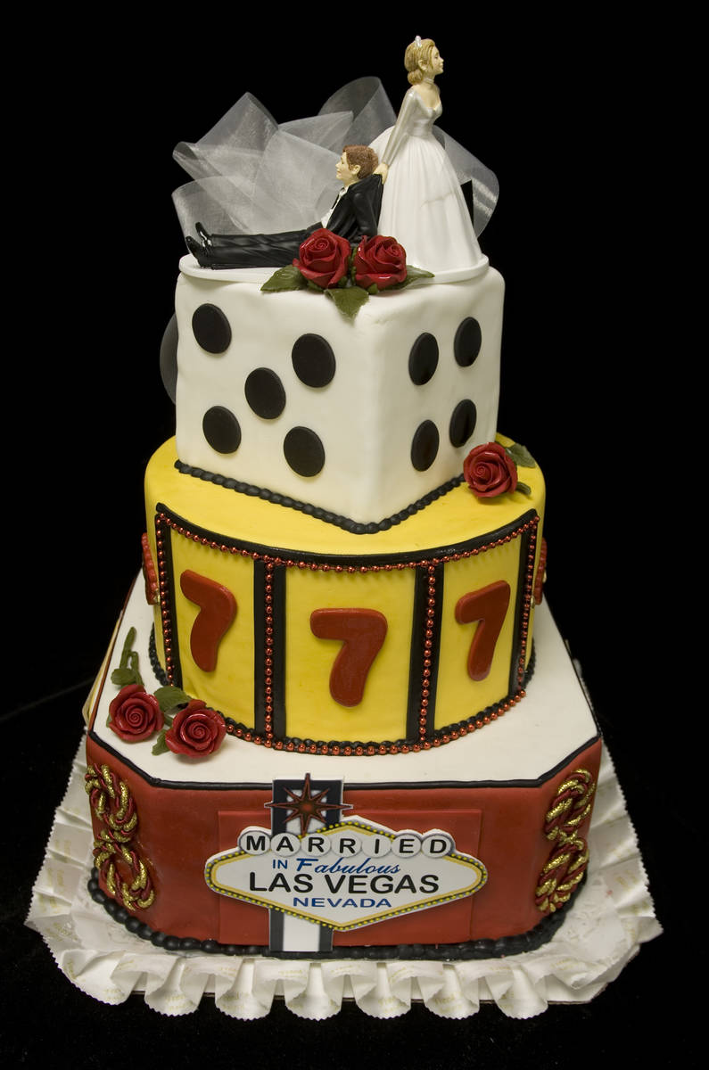 A Vegas-themed wedding cake by Freed's Bakery, which is preparing to open a dessert shop in the ...