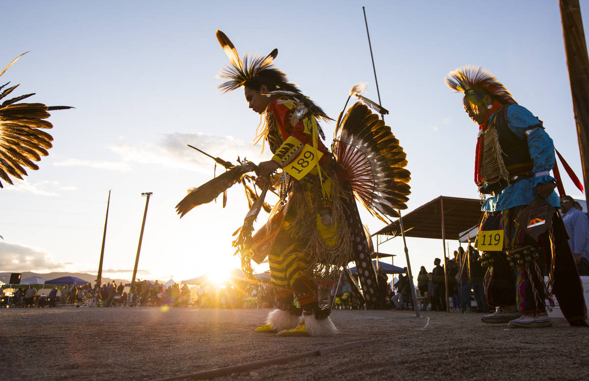 Participants dance during the grand entry ceremonies at the 29th annual Snow Mountain Pow Wow i ...
